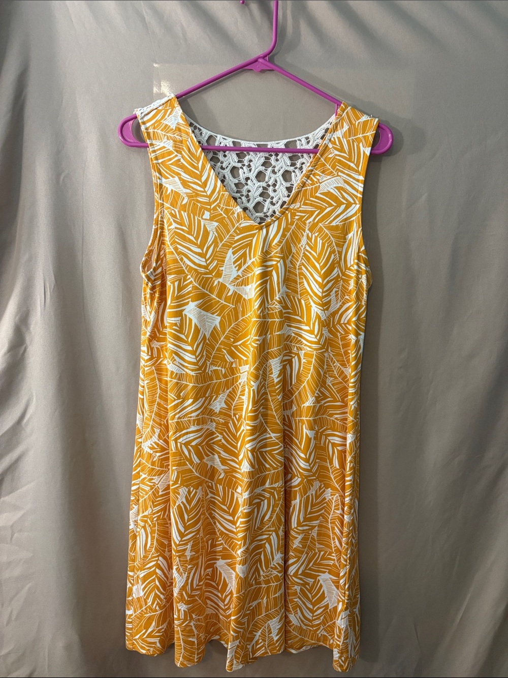 Sleeveless Yellow Leaf-Print Mini Dress with Lace Back Detail